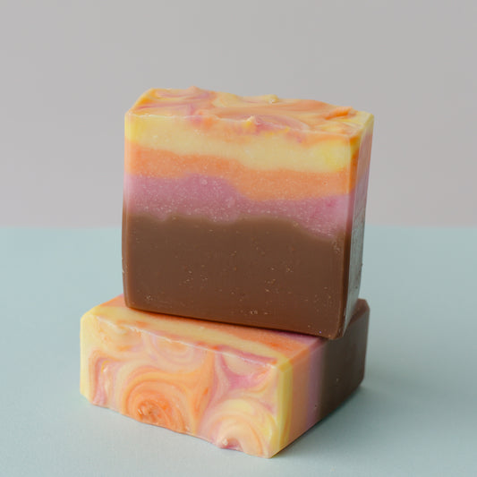 Cold process bar soap called Beach Day with beach towel and sand design